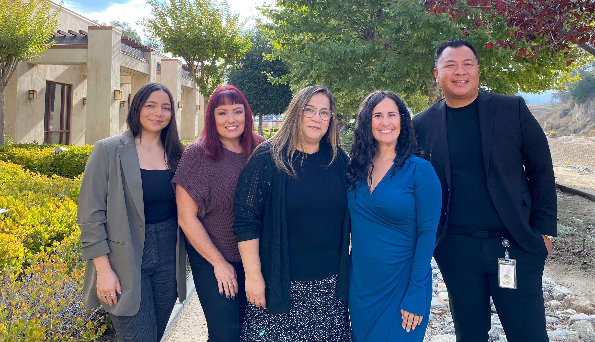 Five Pechanga Child & Family Services staff outside a government building